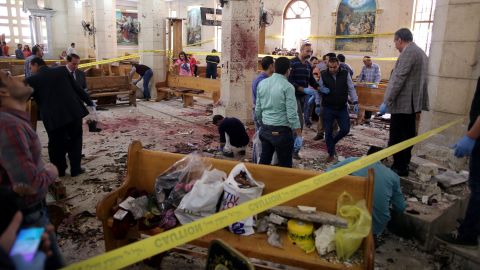 Security personnel investigate the scene of a bomb explosion inside Mar Girgis church in Tanta, Egypt on April 9. 