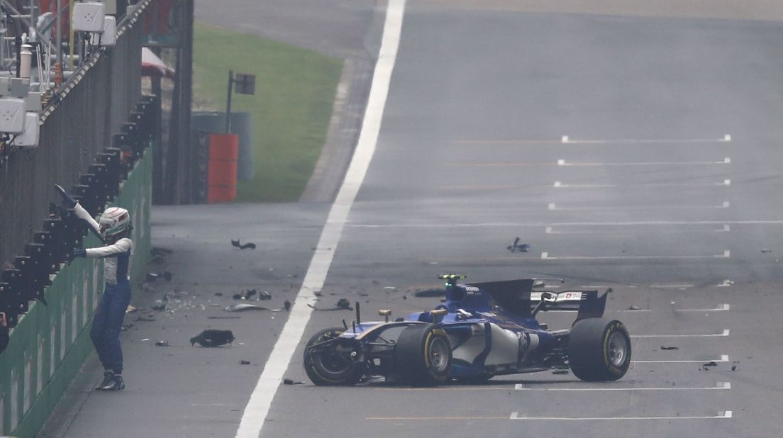 Antonio Giovinazzi of Sauber leaves the track after crashing into the wall of the pit lane.