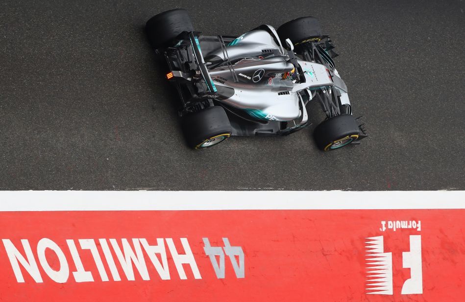 Lewis Hamilton passes through the pit lane at the Chinese Grand Prix.