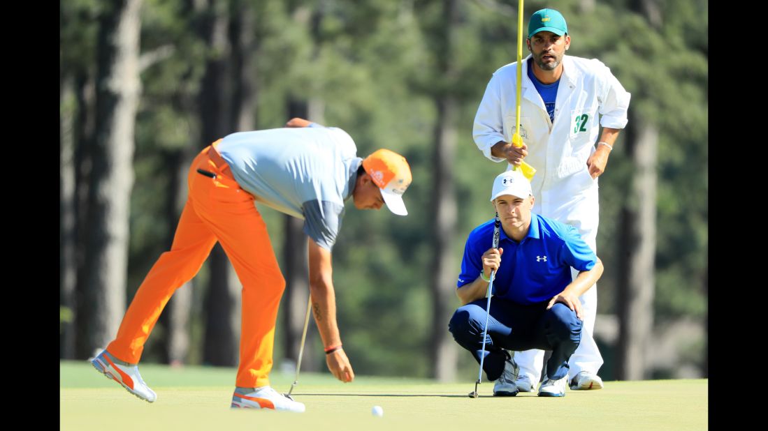 Close friends Jordan Spieth and Rickie Fowler were playing together in the penultimate group Sunday, with Spieth chasing a second green jacket and Fowler a first major title.