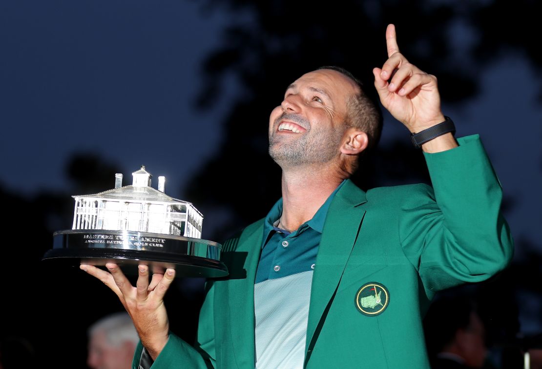 Sergio Garcia of Spain celebrates with the Masters Trophy during the Green Jacket ceremony 
