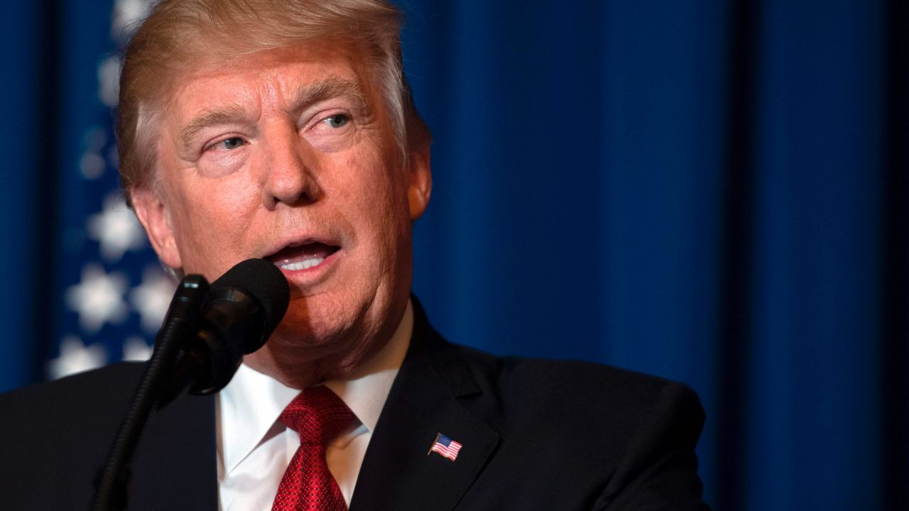 US President Donald Trump delivers a statement on Syria from the Mar-a-Lago estate in West Palm Beach, Florida, on April 6, 2017.
Trump ordered a massive military strike against a Syria Thursday in retaliation for a chemical weapons attack they blame on President Bashar al-Assad. A US official said 59 precision guided missiles hit Shayrat Airfield in Syria, where Washington believes Tuesday's deadly attack was launched.
 / AFP PHOTO / JIM WATSON        (Photo credit should read JIM WATSON/AFP/Getty Images)