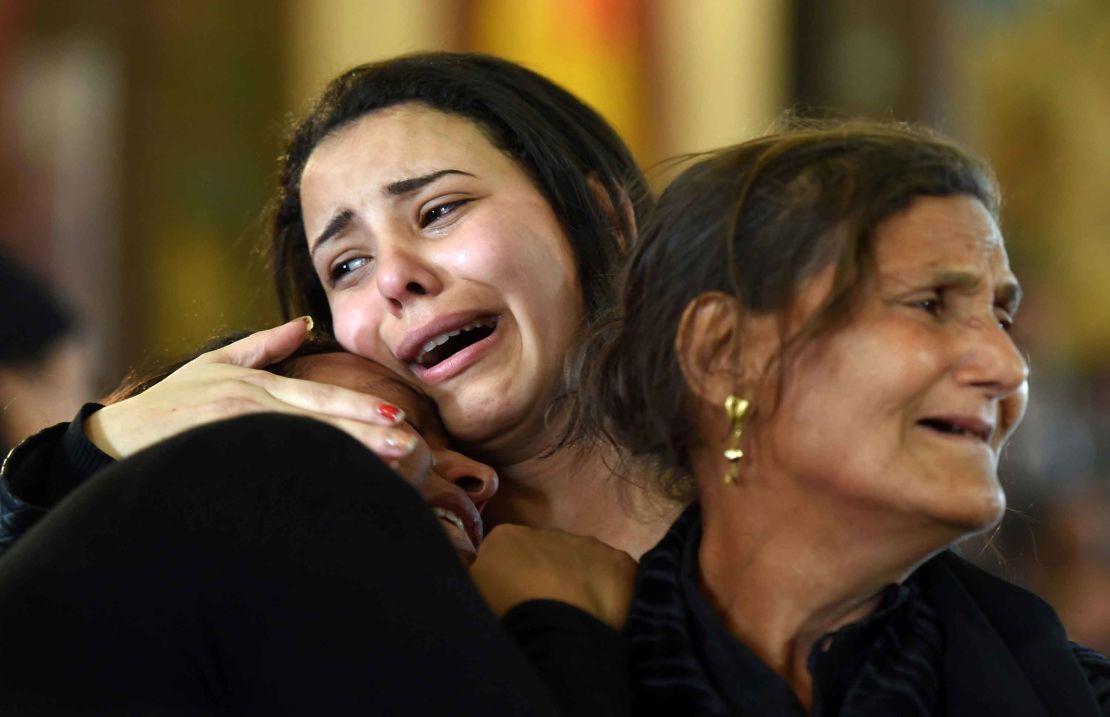 Women mourn for the victims of the blast at the Coptic Christian Saint Mark's church in Alexandria during a funeral on April 10, 2017.