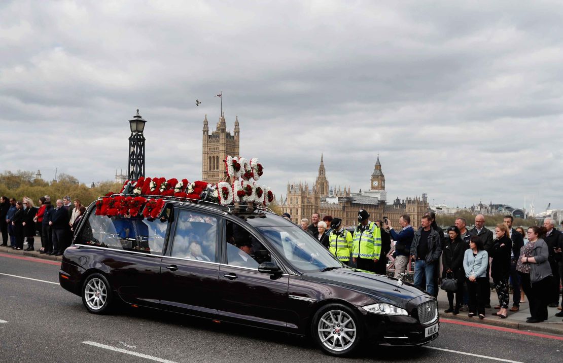 The hearse carrying Palmer's coffin crosses Lambeth Bridge.