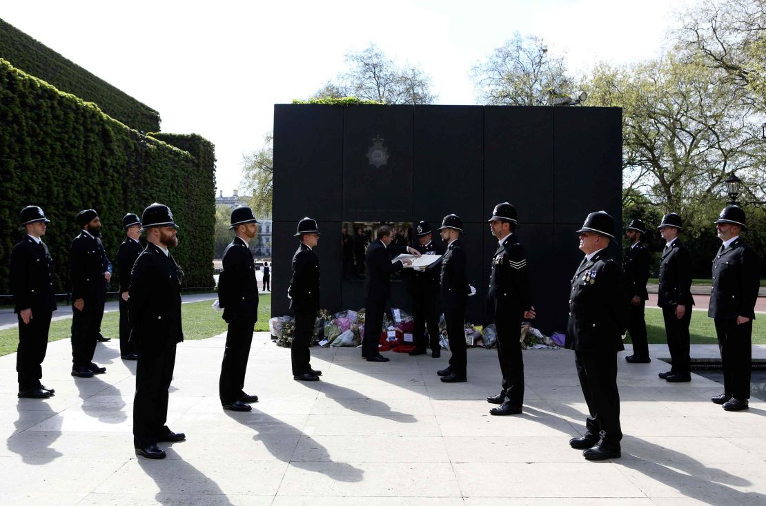Police attend a ceremony where Palmer's name was added to the National Police Memorial's Roll of Honour and Remembrance.