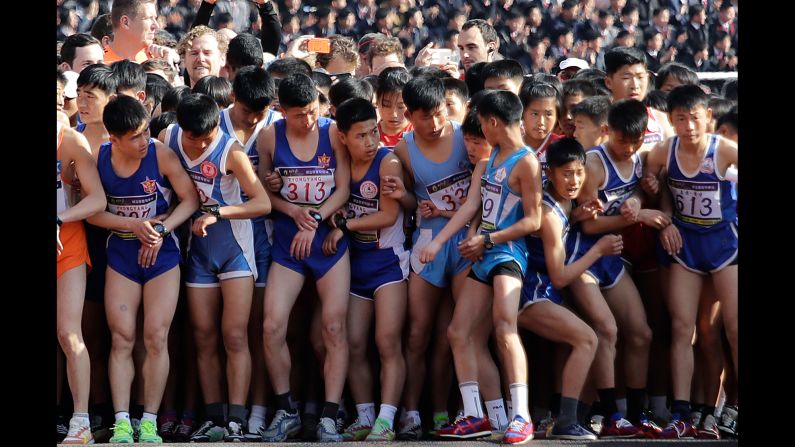 Runners wait at the starting line of the Pyongyang Marathon in North Korea on Sunday, April 9.