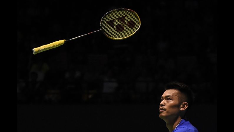 Lin Dan throws his racket during a semifinal match at the Malaysia Open on Saturday, April 8. He would go on to win the badminton tournament. 