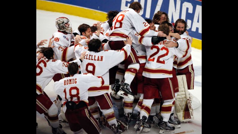 Hockey players from the University of Denver celebrate after winning the NCAA title on Saturday, April 8. The Pioneers defeated Minnesota-Duluth 3-2 to capture their first championship since 2005.