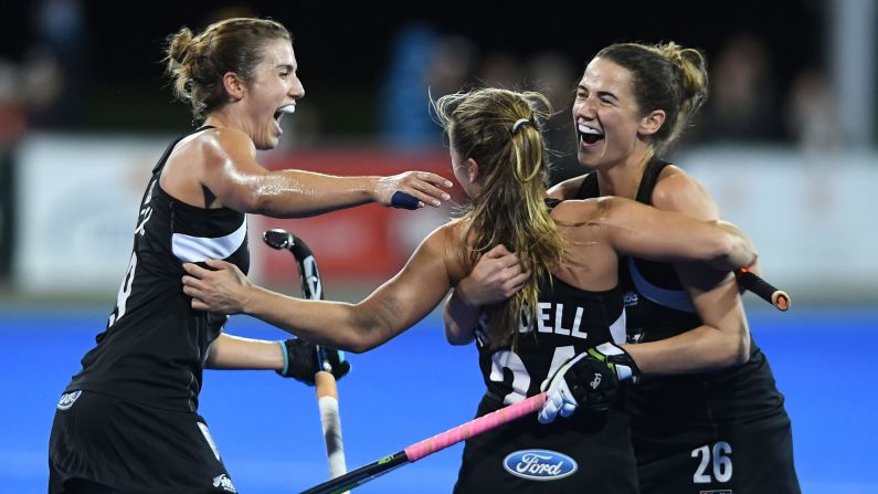New Zealand field hockey players -- from left, Brooke Neal, Elizabeth Keddell and Pippa Hayward -- celebrate a goal against Japan during the Festival of Hockey on Sunday, April 9.