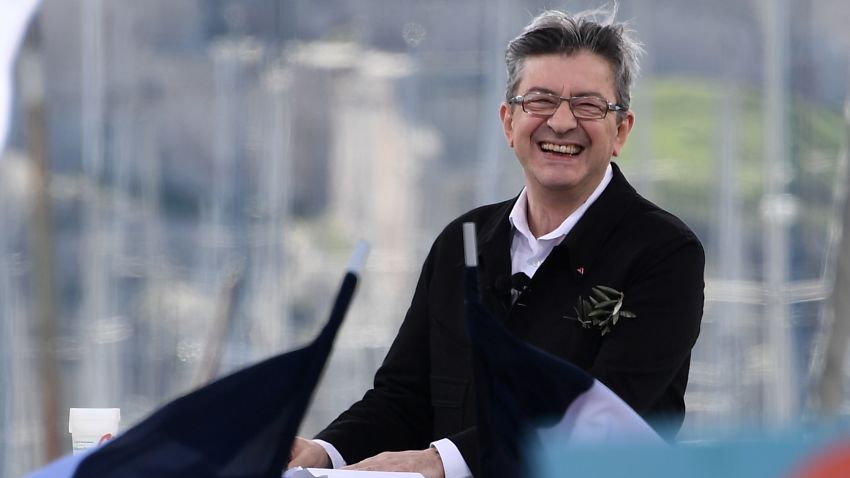 French presidential election candidate for the far-left coalition La France insoumise Jean-Luc Melenchon smiles as he delivers a speech during a public meeting at the Old Port of Marseille, southern France, on April 9, 2017. / AFP PHOTO / Anne-Christine POUJOULAT        (Photo credit should read ANNE-CHRISTINE POUJOULAT/AFP/Getty Images)