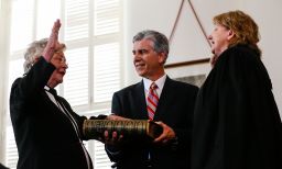 Kay Ivey, left, takes the oath of office to be governor of Alabama as she is sworn in by acting Chief Justice Lyn Stuart on April 10, 2017, in Montgomery, Alabama.