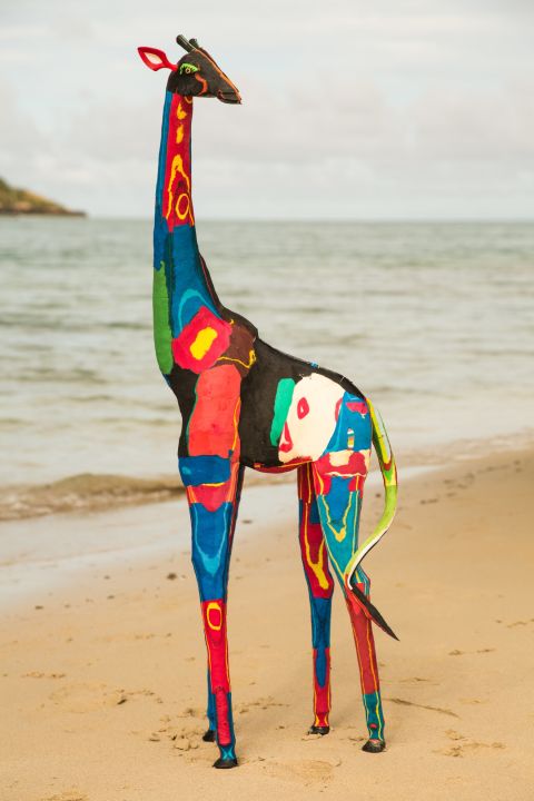 Since then, the collective's flip flop sculptures have ranged from handheld creations to an 18-foot life-sized giraffe. 