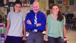 Teacher Brian O'Conner with two former students who were inspired by CNN Heroes.
