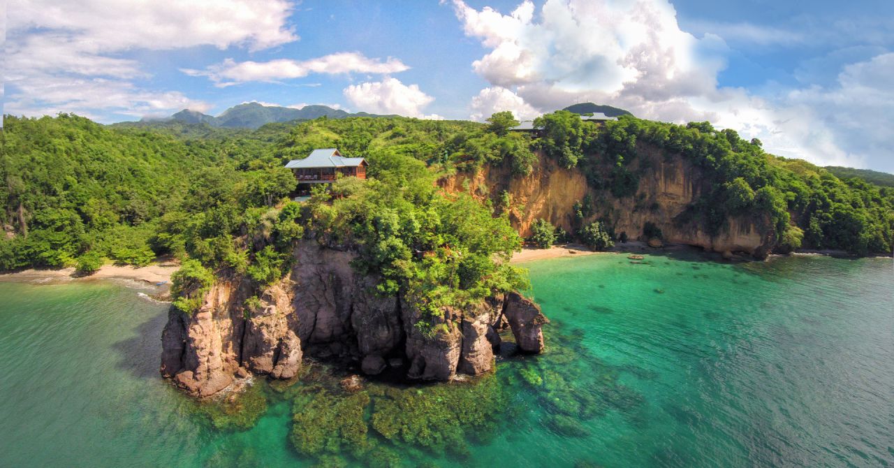 <strong>Secret Bay </strong>-- With eight bungalows hidden amid thick foliage on a cliff in Dominica, Secret Bay feels as if it were built for lovers.