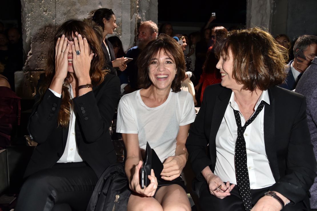 Lou Doillon, Charlotte Gainsbourg and Jane Birkin attend the Saint Laurent show at Paris Fashion Week in September, 2016