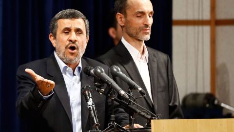 Ahmadinejad (left) speaks, accompanied by former Iranian Vice President Hamid Baghaei, after registering at the Interior Ministry's election headquarters.
