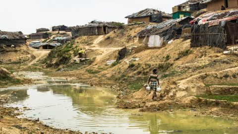 People fetching water in the makeshift extension to Kutupalong camp in Ukhiya, Cox's Bazar district, south eastern Bangladesh on 9 April, 2017.
