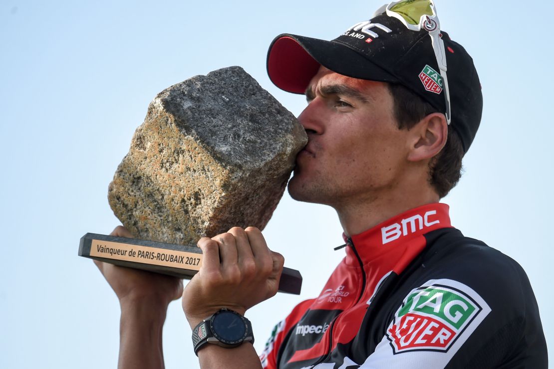 Greg Van Avermaet kisses his cobble trophy after winning the Paris-Roubaix one-day classic cycling race.
