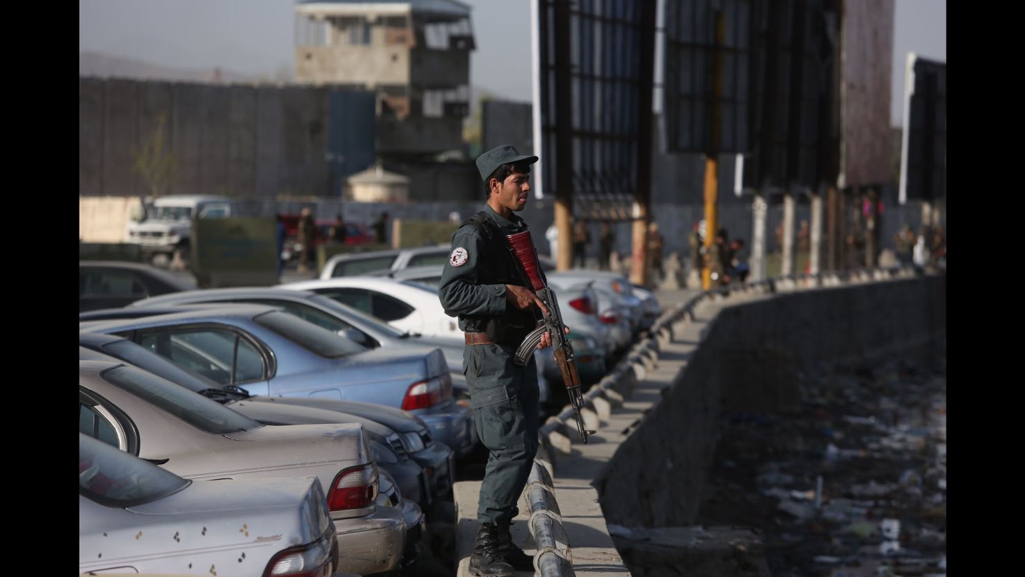 Security forces stand by Wednesday after a suicide blast near government offices in the Afghan capital.