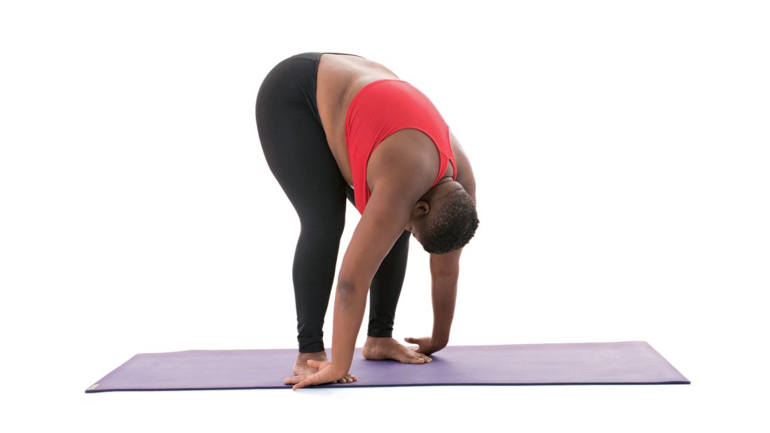 <strong>Standing forward fold: Uttanasana</strong> "On the exhale, fold forward from your hips as you draw your arms, hands and heart to the floor," Stanley says. "Keep your hips stacked over your knees. Relax your shoulders. Let your neck hang long and loose."