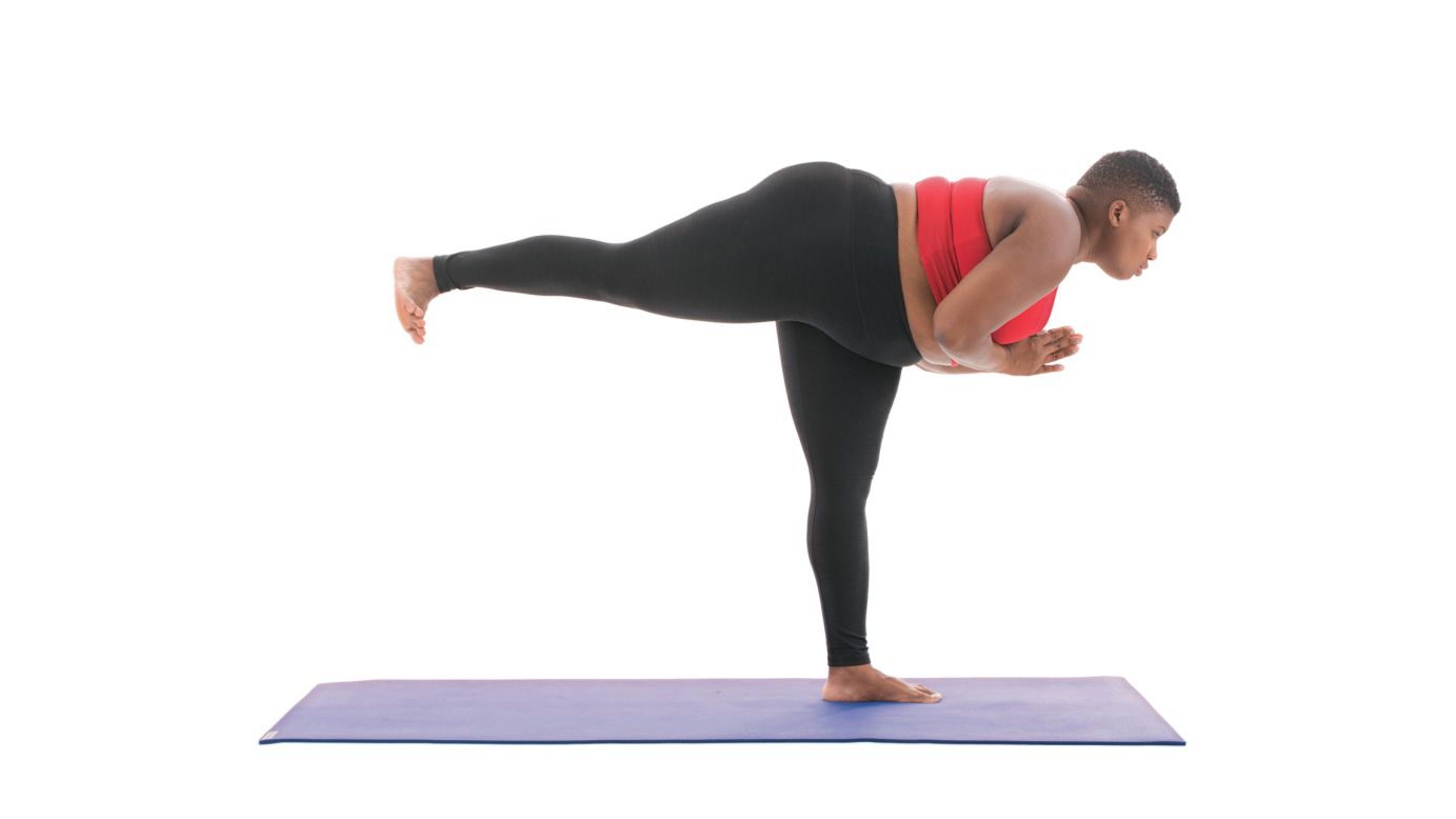 <strong>Warrior III: Virbhadrasana III </strong>In this pose, Stanley tells readers to "Flex VERY actively through all ten of your toes, pressing into the big toe of your standing leg. Square your hips forward and spin your back toes to the floor or as close as possible." She says to focus your gaze forward to help with your balance.