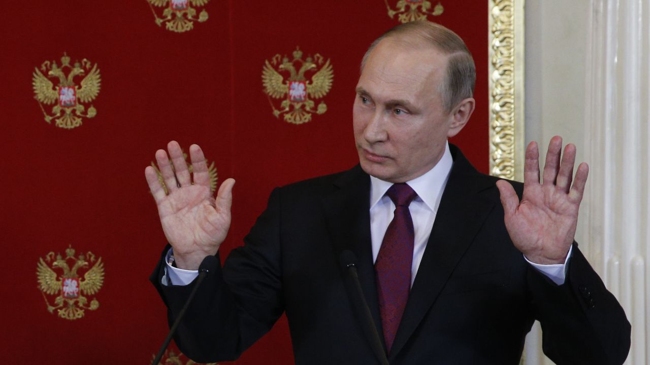 Russian President Vladimir Putin reacts during a joint press conference with Italian counterpart Sergio Mattarella after a meeting in Moscowís Kremlin, Russia, Tuesday, April 11, 2017. Sergio Mattarella is in Russia on an official visit. (Sergei Chirikov/ Pool photo via AP)