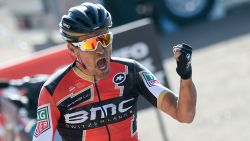 Belgium's Greg Van Avermaet celebrates as he crosses the finish line at the end of the 115th edition of the Paris-Roubaix one-day classic cycling race, between Compiegne and Roubaix, on April 9, 2017 in Roubaix, northern France. / AFP PHOTO / François LO PRESTI        (Photo credit should read FRANCOIS LO PRESTI/AFP/Getty Images)