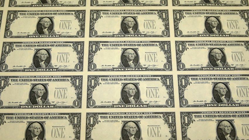 A sheet of freshly printed one dollar bills is ready for inspection at the Bureau of Engraving and Printing on March 24, 2015  in Washington, DC.
