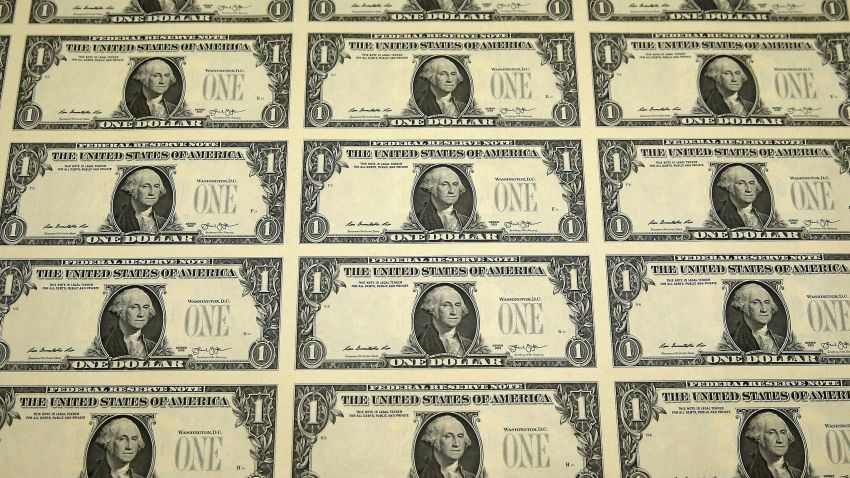 A sheet of freshly printed one dollar bills is ready for inspection at the Bureau of Engraving and Printing on March 24, 2015 in Washington, DC.