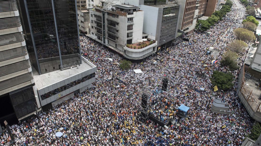 Thousands of demonstrators protest against Maduro in Caracas on Saturday, April 8.