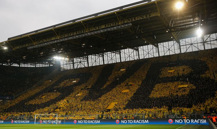 Dortmund's famed 'yellow wall' -- Europe's largest free standing terrace which holds 25,000 fans -- was subdued in the first half as Dortmund struggled against Monaco in their Champions League first-leg tie.