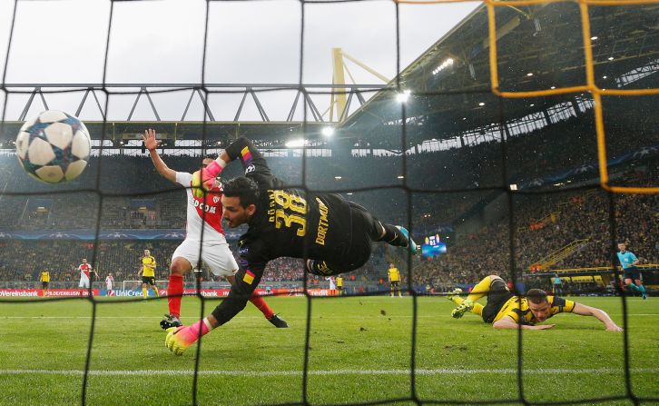 From bad to worse. Dortmund's Sven Bender scored an own goal, heading Andrea Raggi's cross into his own net, as the German side fell 2-0 behind in the first half.