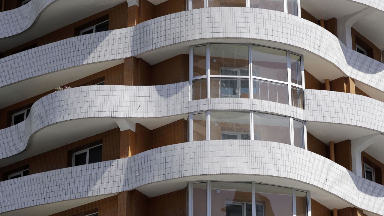 More than a dozen newly constructed apartment buildings on show.