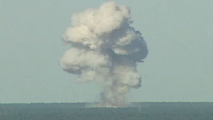 In this U.S. Air Force handout,  a GBU-43/B bomb, or Massive Ordnance Air Blast (MOAB) bomb, explodes November 21, 2003 at Eglin Air Force Base, Florida. MOAB is a 21,700-pound that was droped from a plane at 20, 000 feet. 