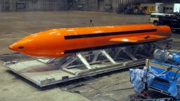 030311-D-9085M-007	A Massive Ordnance Air Blast (MOAB) weapon is prepared for testing at the Eglin Air Force Armament Center on March 11, 2003.  The MOAB is a precision-guided munition weighing 21,500 pounds and will be dropped from a C-130 Hercules aircraft for the test.  It will be the largest non-nuclear conventional weapon in existence.  The MOAB is an Air Force Research Laboratory technology project that began in fiscal year 2002 and is to be completed this year.  DoD photo.  (Released)