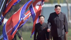 North Korean leader Kim Jong Un, right, arrives for the official opening of the Ryomyong residential area, a collection of more than a dozen apartment buildings, Thursday, April 13, 2017, in Pyongyang, North Korea. (AP Photo/Wong Maye-E)