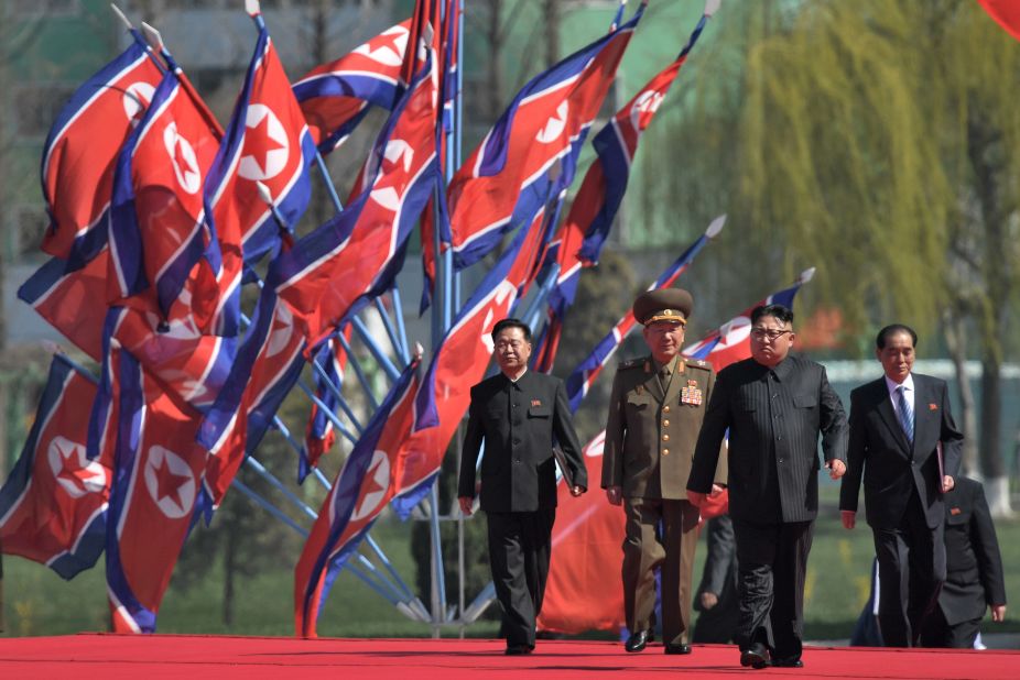 North Korean leader Kim Jong Un walks to the stage during the opening of Ryomyong Street, a high profile construction project in Pyongyang, on April 13, 2017