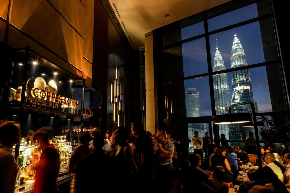 <strong>Coppersmith: </strong>Coppersmith inhabits the shadowed walkways between a wine bar and a restaurant in the imposing Troika towers. It's small but stately, with high ceilings and full-length windows with a view of the Petronas twin towers.