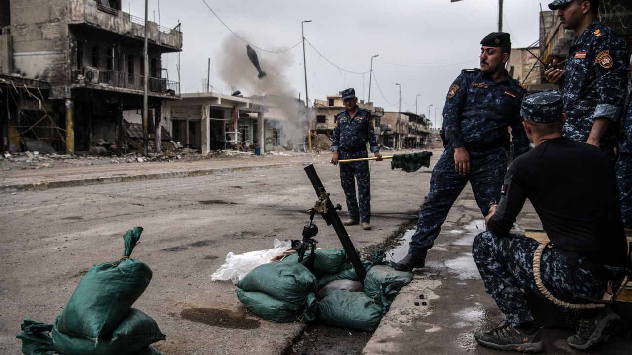 Iraqi federal police fire a mortar at an ISIS position in Mosul, Iraq, on Wednesday, April 12. Iraqi forces <a href="http://www.cnn.com/interactive/2017/03/world/mosul-iraq-cnnphotos/index.html" target="_blank">have been fighting ISIS militants</a> for control of the city.