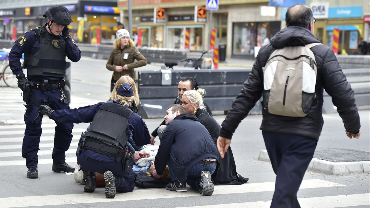 A person receives medical attention after <a href="http://www.cnn.com/2017/04/11/europe/stockholm-terror-attack-rakhmat-akilov/" target="_blank">a truck hit pedestrians</a> in Stockholm, Sweden, on Friday, April 7.