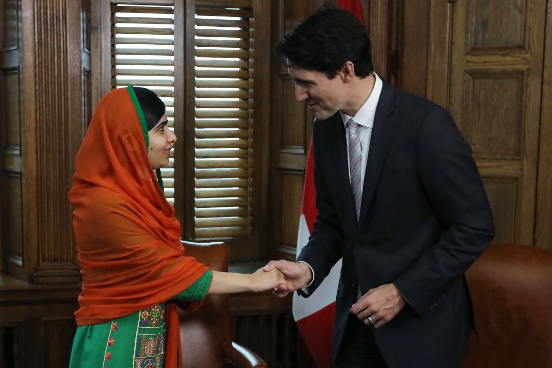 Malala Yousafzai shakes hands with Canadian Prime Minister Justin Trudeau on Parliament Hill in Ottawa.