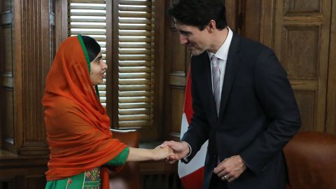 Malala Yousafzai shakes hands with Canadian Prime Minister Justin Trudeau on Parliament Hill in Ottawa.