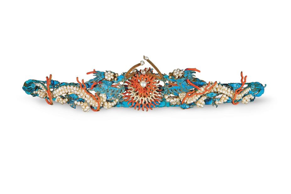 The show juxtaposes Chaumet's jewels with imperial works from the Palace Museum, such as this Qing dynasty double-dragon hair pin, set in gilded and colored silver, pearls, coral and glass.