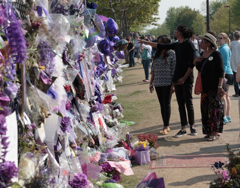 <strong>Tributes -- </strong>After his death, tributes from around the world were pinned to the fence that surrounds Paisley Park. 