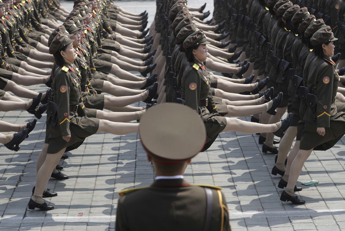 Female North Korean soldiers march during the parade.