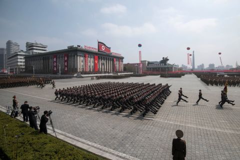 Korean People's Army soldiers march on Kim Il-Sung square.