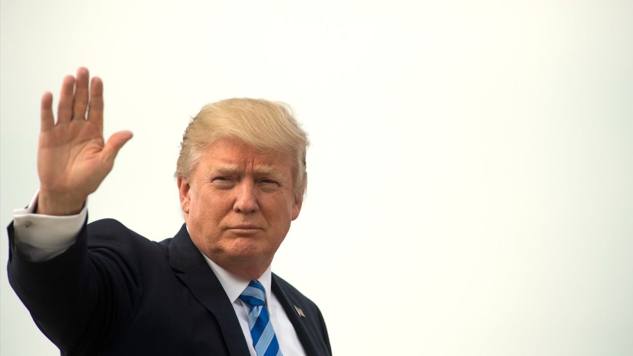 US President Donald Trump boards Air Force One at Andrews Air Force Base, Maryland, April 13, 2017. 