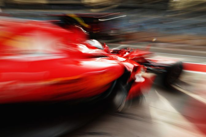 Ferrari's Kimi Raikkonen leaving the pit garage in Bahrain. The Finn has finished on the podium in Sakhir eight times -- more than any other driver -- but has never won the race. 