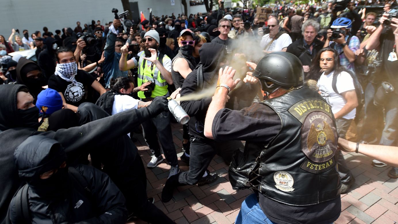 A man is sprayed with a chemical irritant as multiple fights break out between <a href="http://www.cnn.com/2017/04/15/us/berkeley-protests-trump/index.html" target="_blank">Trump supporters and protesters in Berkeley</a>, California. 
