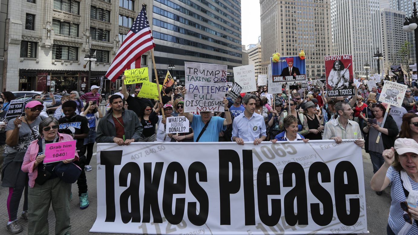 Demonstrators participate in the march and rally in Chicago.